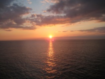 Solnedgang sjø hav