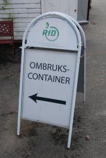 Ombrukscontainer, skilt